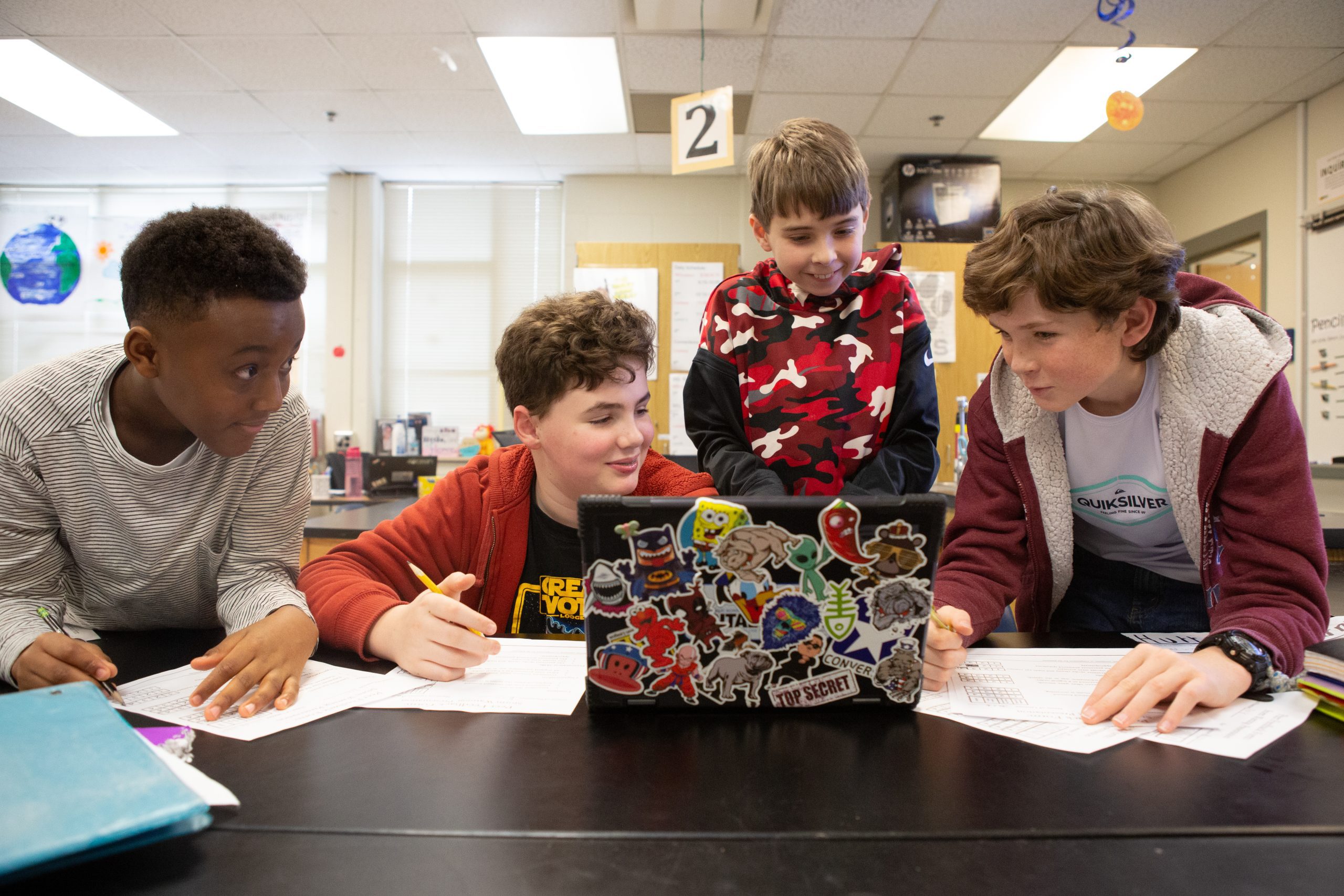 Four Male Middle School Students Working on a Project - JA of Norcal